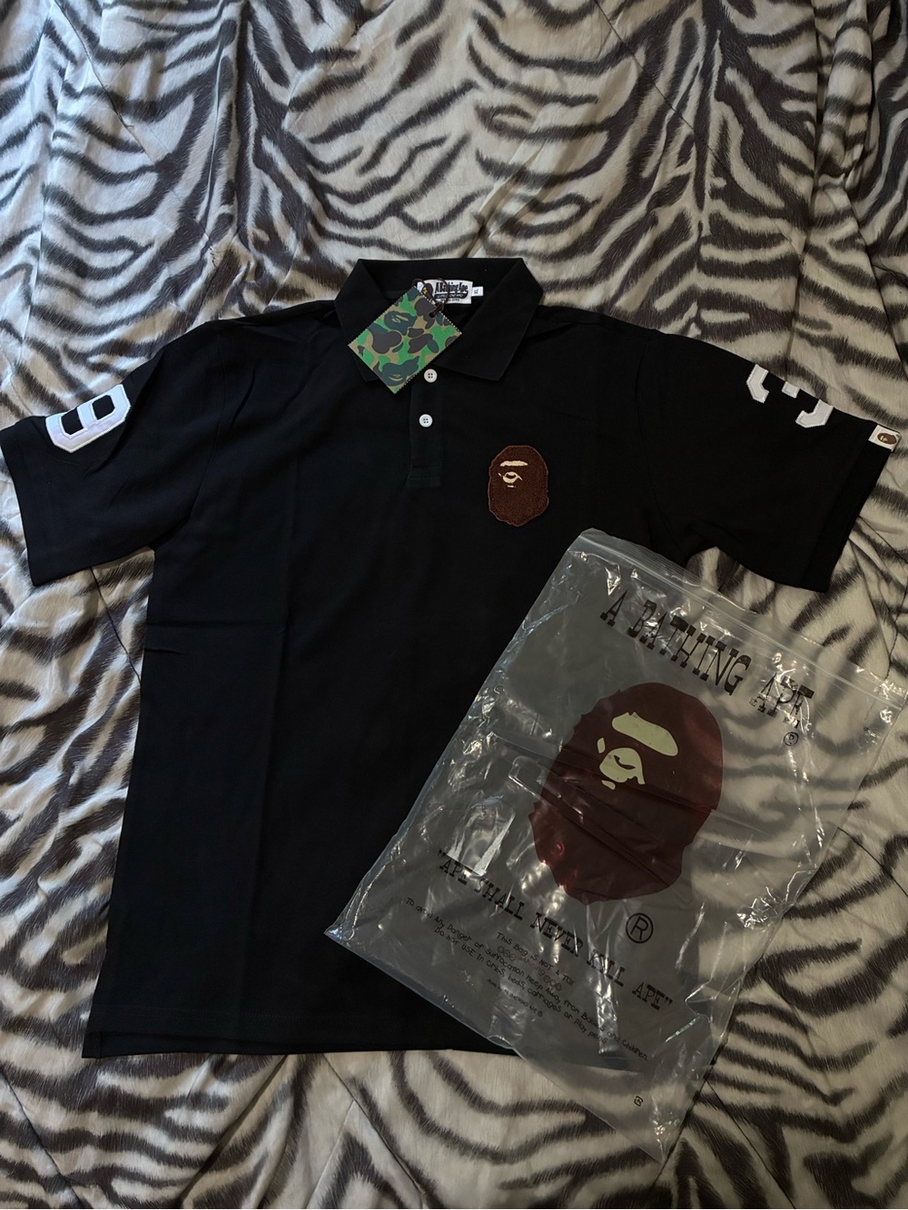 A Bathing Ape Black Polo Shirt with Ape Head Patch
